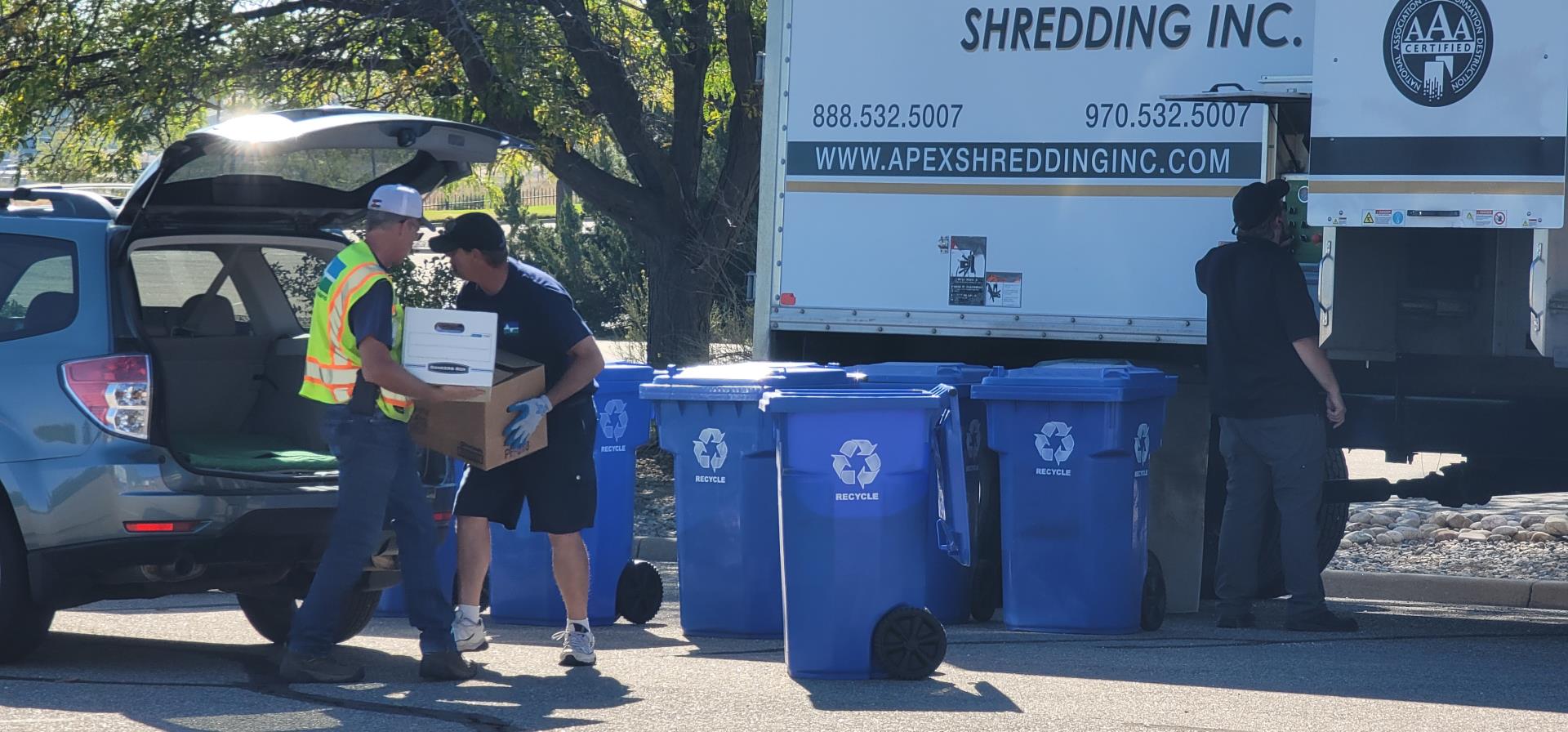 City of Loveland Public Works crews and APEX shredding work to shred paper at the City's shred event.