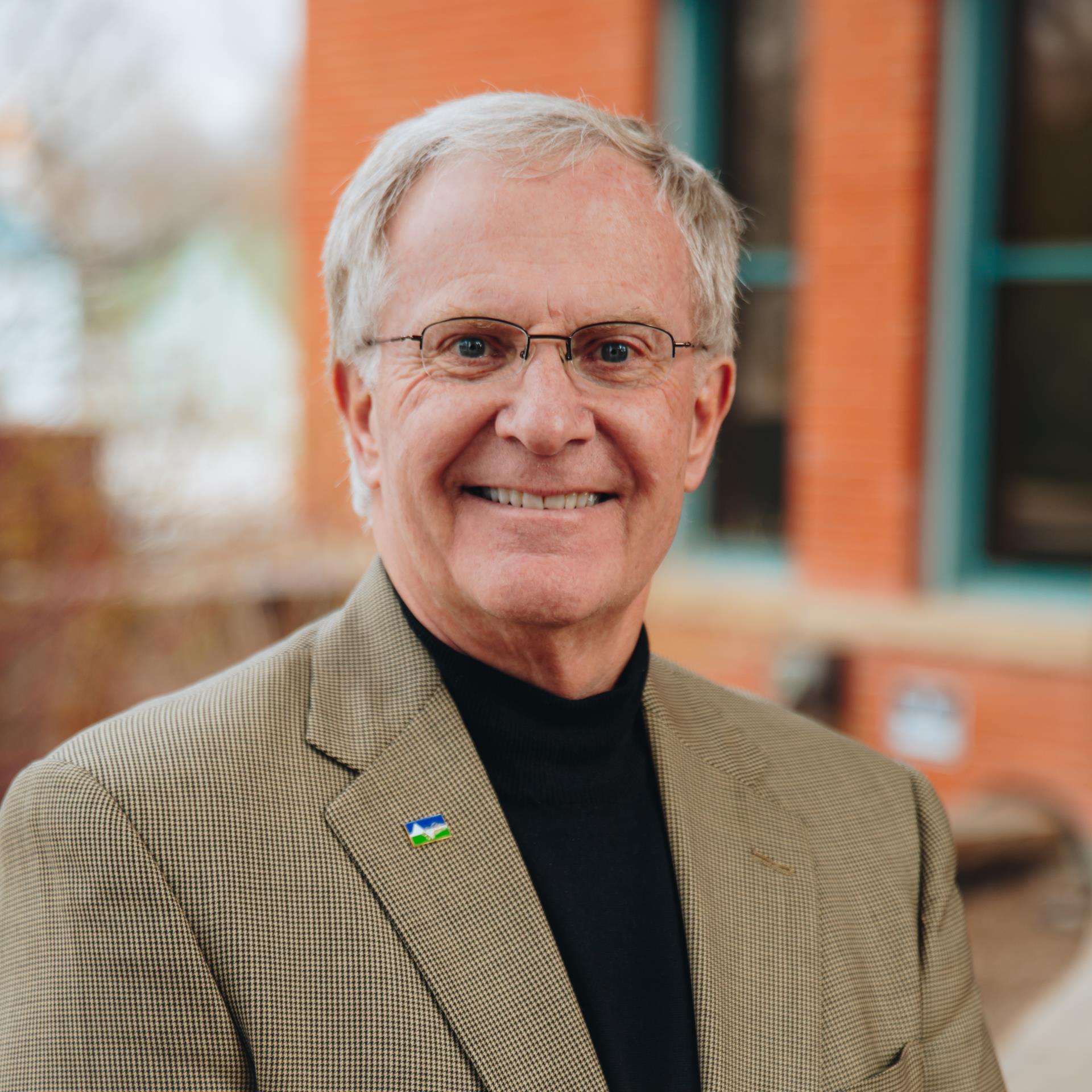 Headshot of Loveland Deputy City Manager Rod Wensing in front of City Hall.